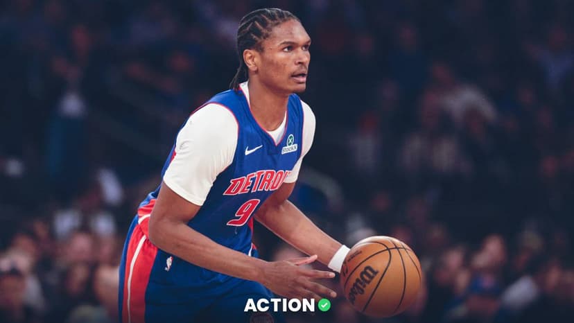 Green double couch with wooden legs