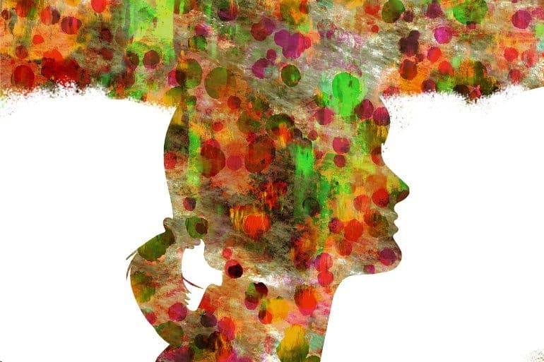 Green double couch with wooden legs